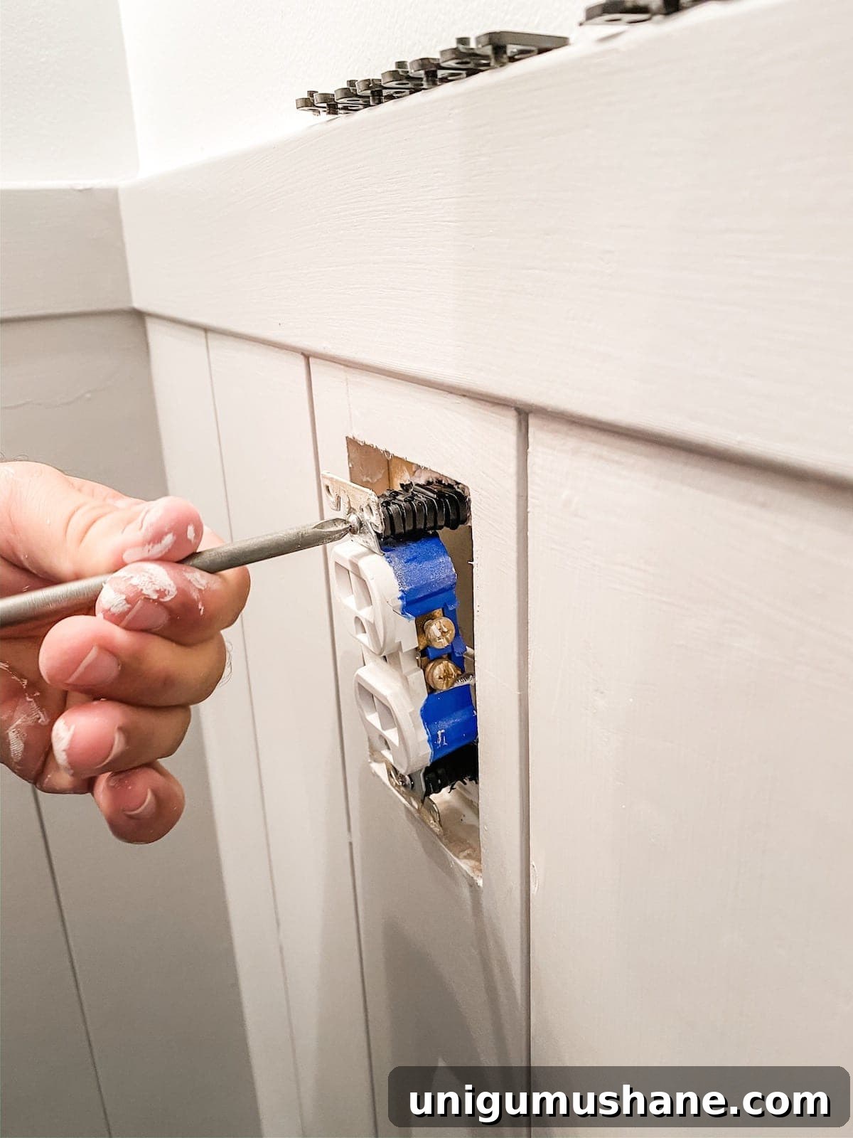 DIY Vertical Shiplap Wainscoting for Bathroom Walls 13 outlet spacers to push out outlet flush with shiplap in a bathroom