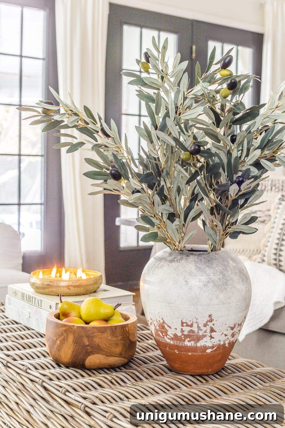DIY Fall Decor Projects to Make Your Home Cozy 8 terracotta vase with olive branches wooden bowl with pears and fall candle
