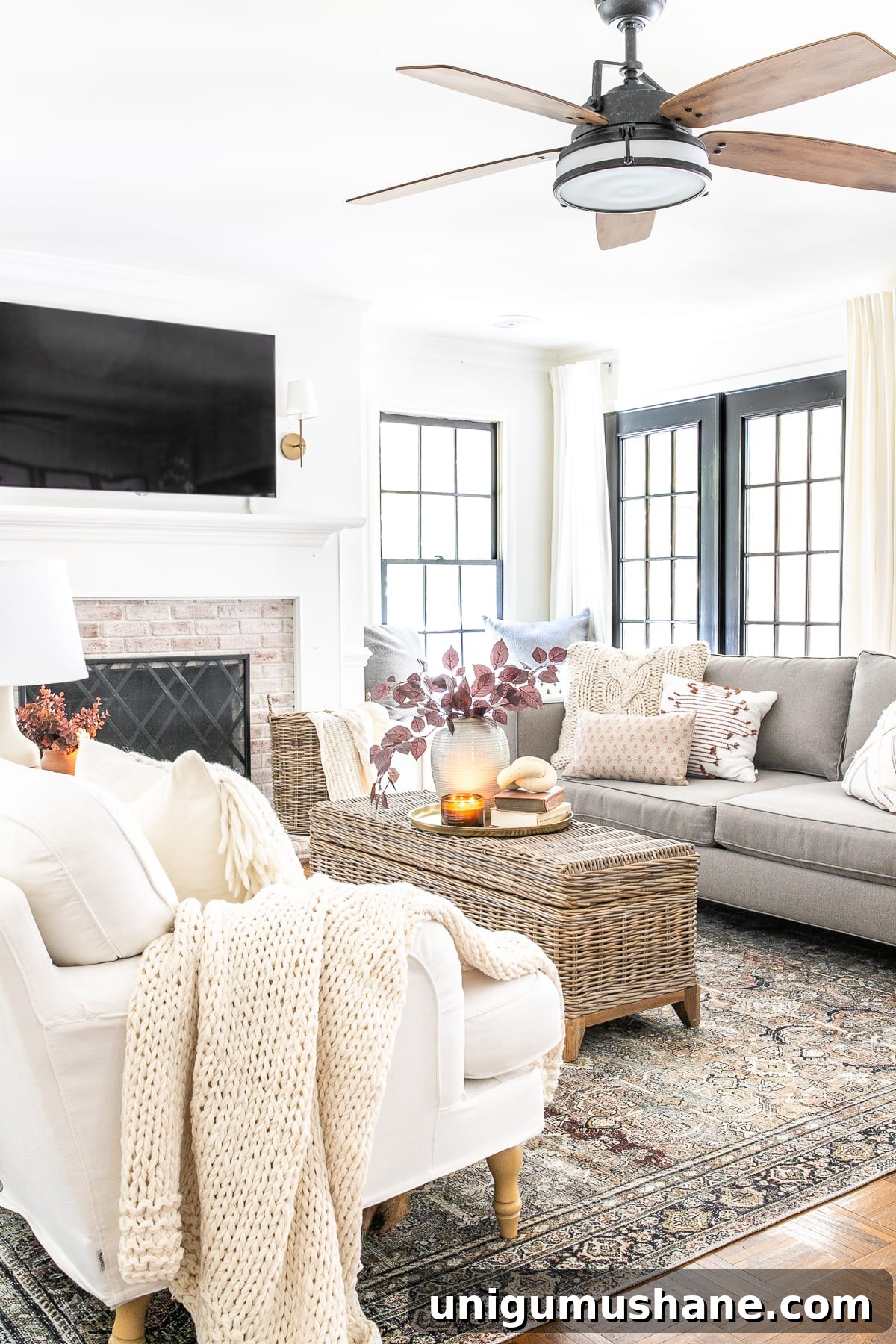 fall living room with fall leaves and vintage style rug