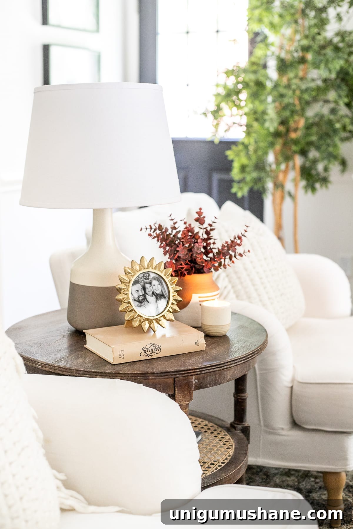 living room end table with fall stems in vase