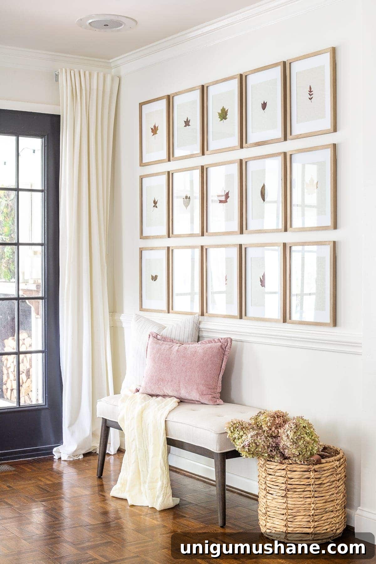 Pressed Leaf Gallery Wall Ideas for Fall Entryways 11 entryway decorated for fall with pressed leaf gallery wall and basket of dried hydrangeas