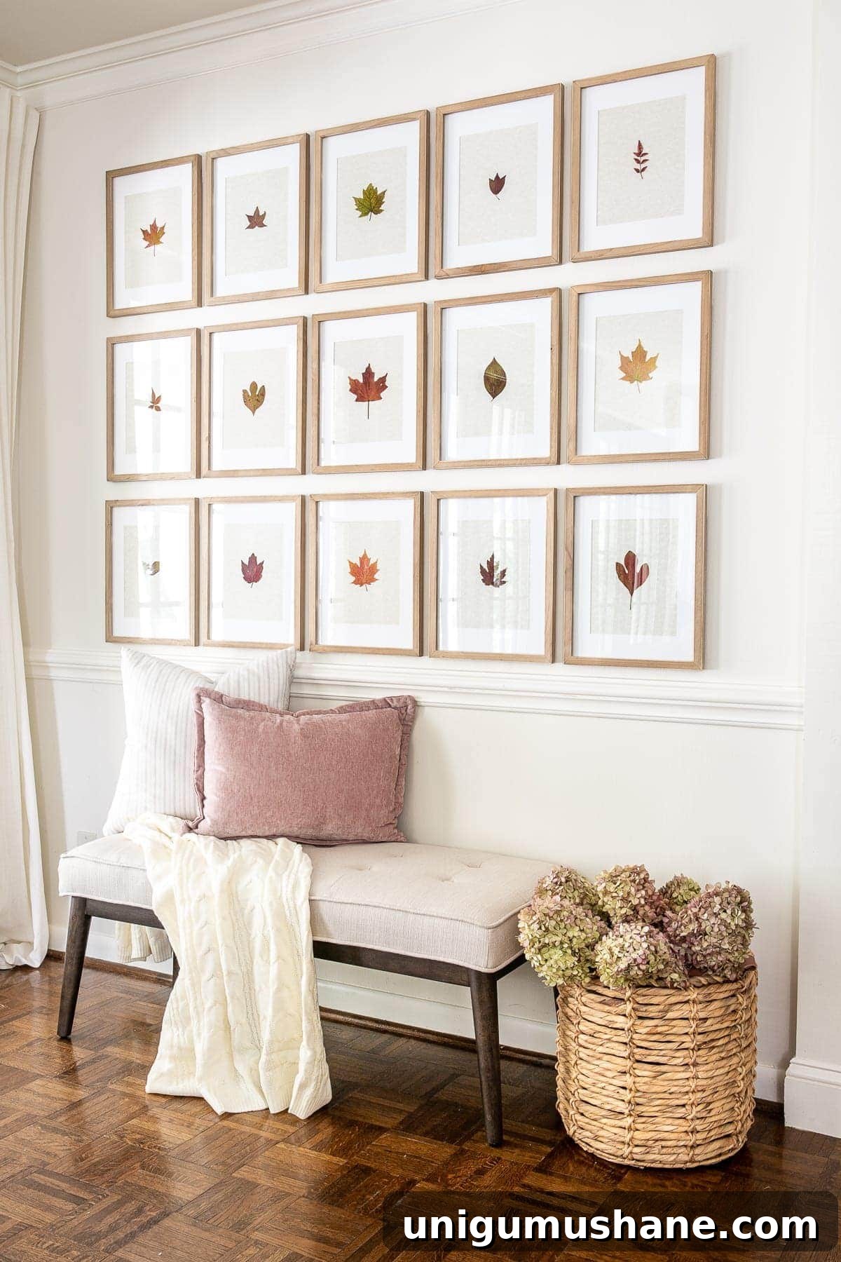 Pressed Leaf Gallery Wall Ideas for Fall Entryways 4 fall entryway using gallery wall with pressed leaves and dried hydrangeas in a basket beside a bench