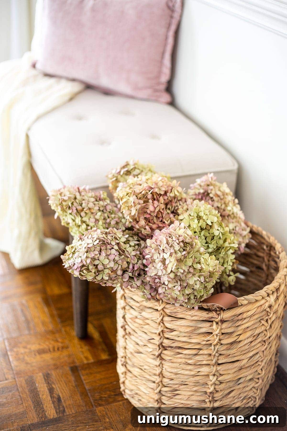 Pressed Leaf Gallery Wall Ideas for Fall Entryways 8 dried hydrangeas in a basket next to an entryway bench