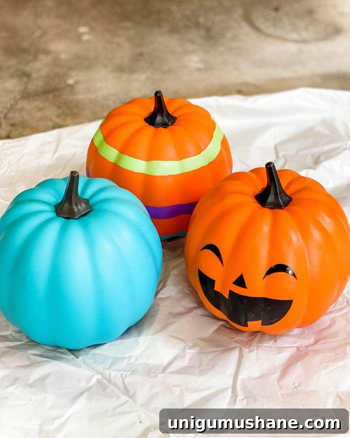 3 Modern Pumpkin Painting Ideas for Chic Fall Decor 2 fake pumpkins