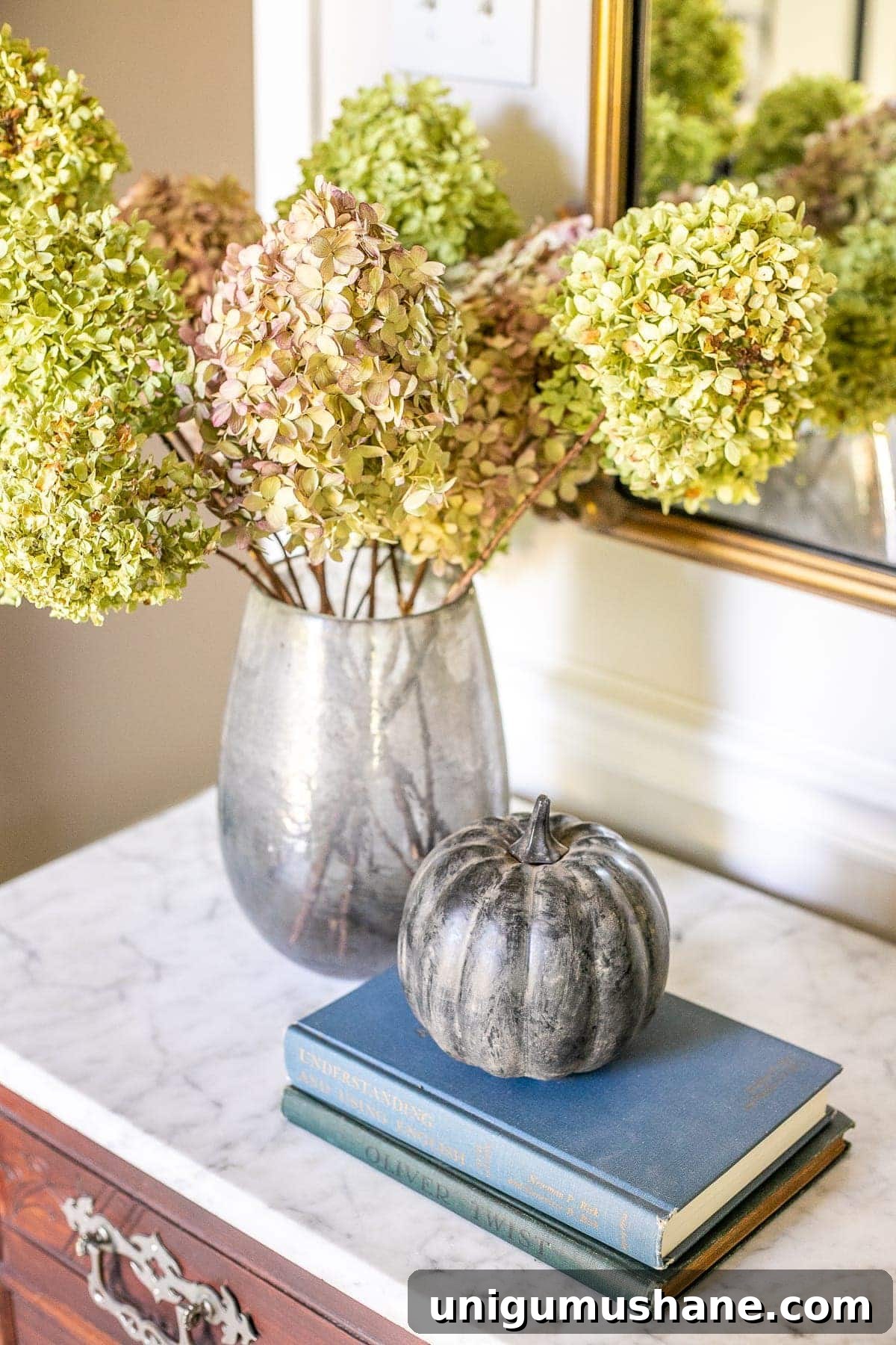 3 Modern Pumpkin Painting Ideas for Chic Fall Decor 13 black earthenware pumpkin