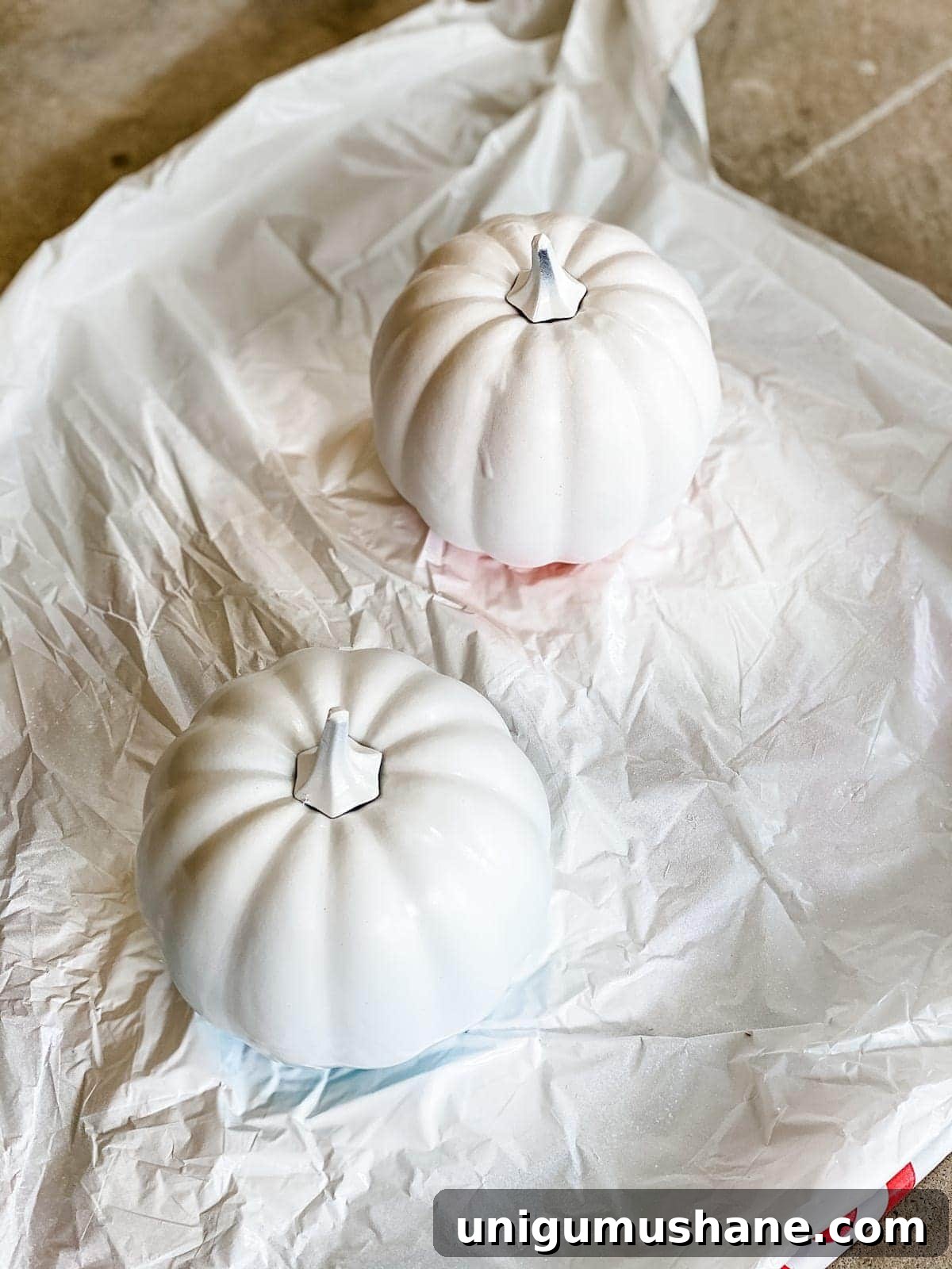 3 Modern Pumpkin Painting Ideas for Chic Fall Decor 3 fake pumpkins with primer