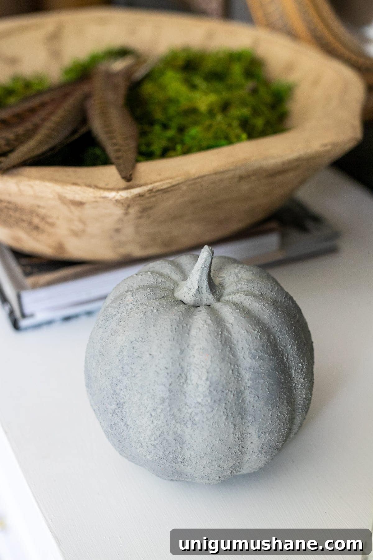3 Modern Pumpkin Painting Ideas for Chic Fall Decor 8 fake pumpkin painted to look like concrete