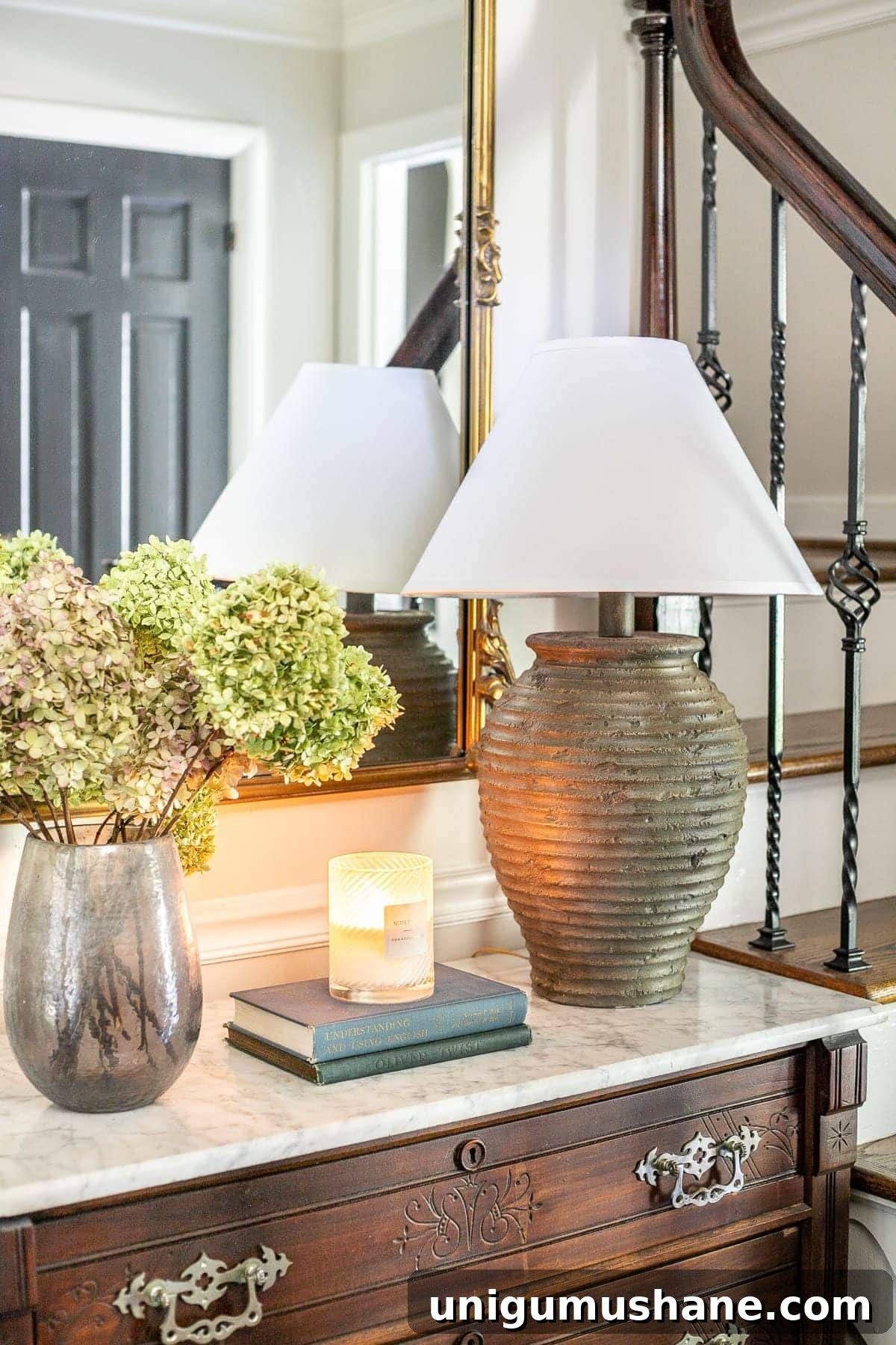 A thrifted $5 table lamp gets a DIY terra cotta paint makeover and new designer dupe look. 