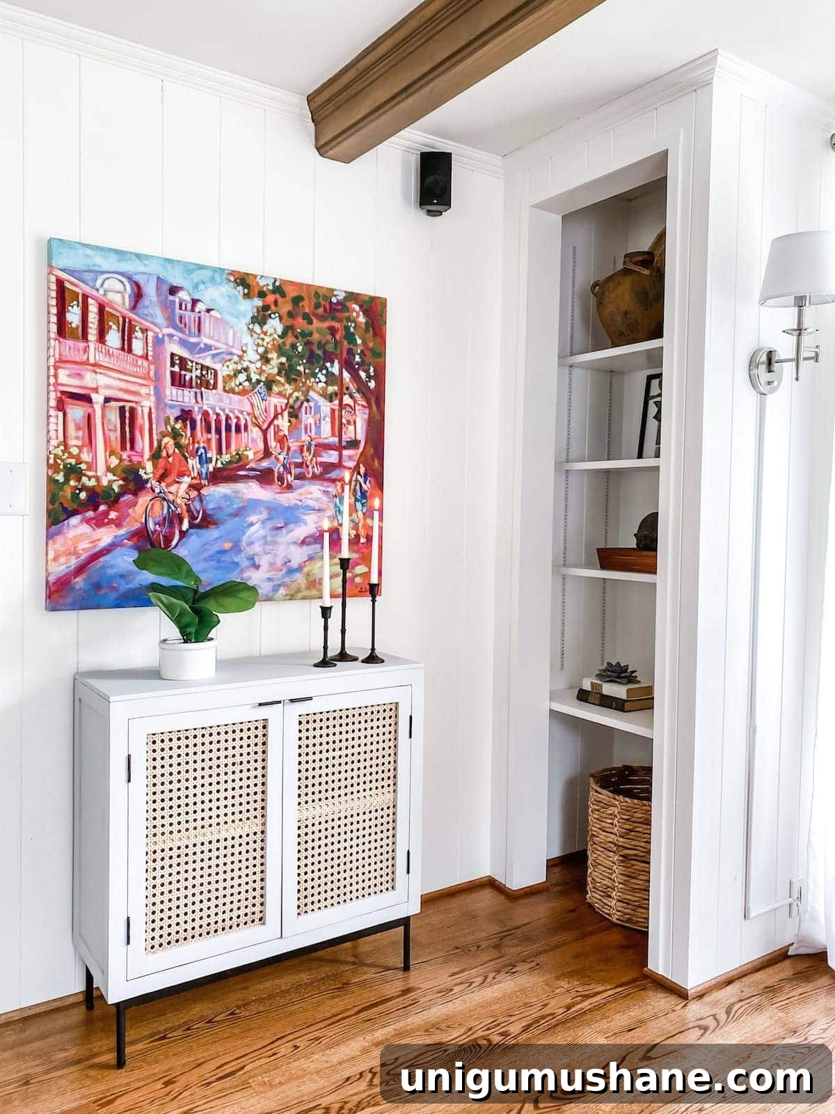 McNay Project: Tour a Modern Coastal Living Room 16 Accent cabinet with vibrant painting