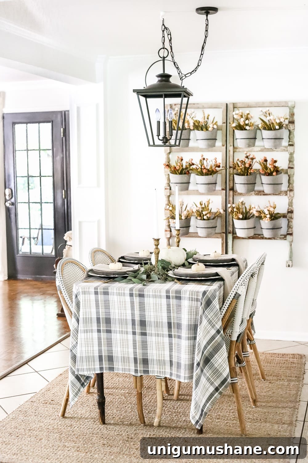 14 Fall Decor Finds to Shop at Thrift Stores 16 fall table with plaid tablecloth and wall planter