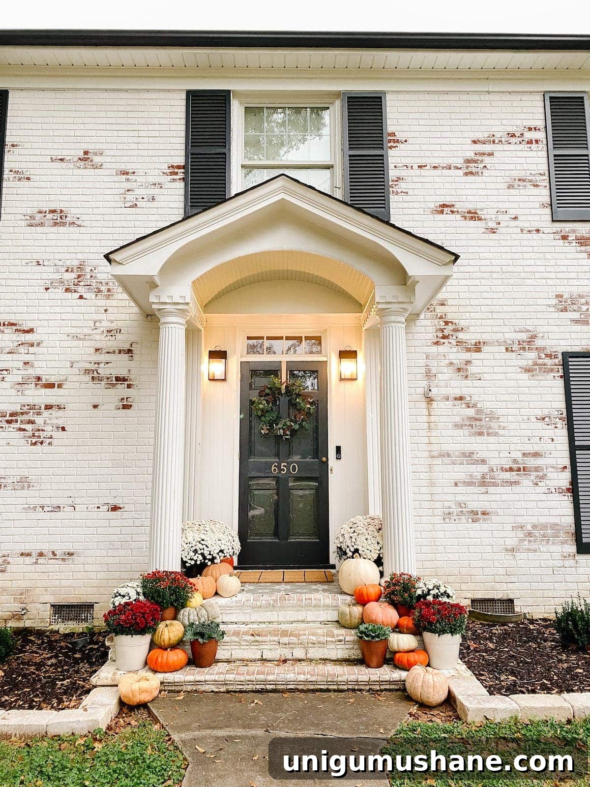 Colorful Fall Porch Stoop Decor for a Cozy Entryway 2 Colorful Fall Porch Stoop Decorated with Mums and Pumpkins with Limewashed Brick