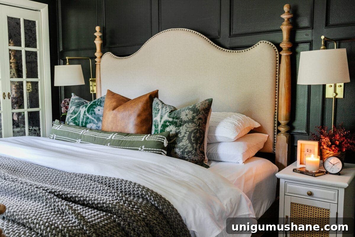 Mix and Match Throw Pillows: 7 Tips for a Cohesive Sofa Look 3 throw pillows on a bed with black walls and linen headboard