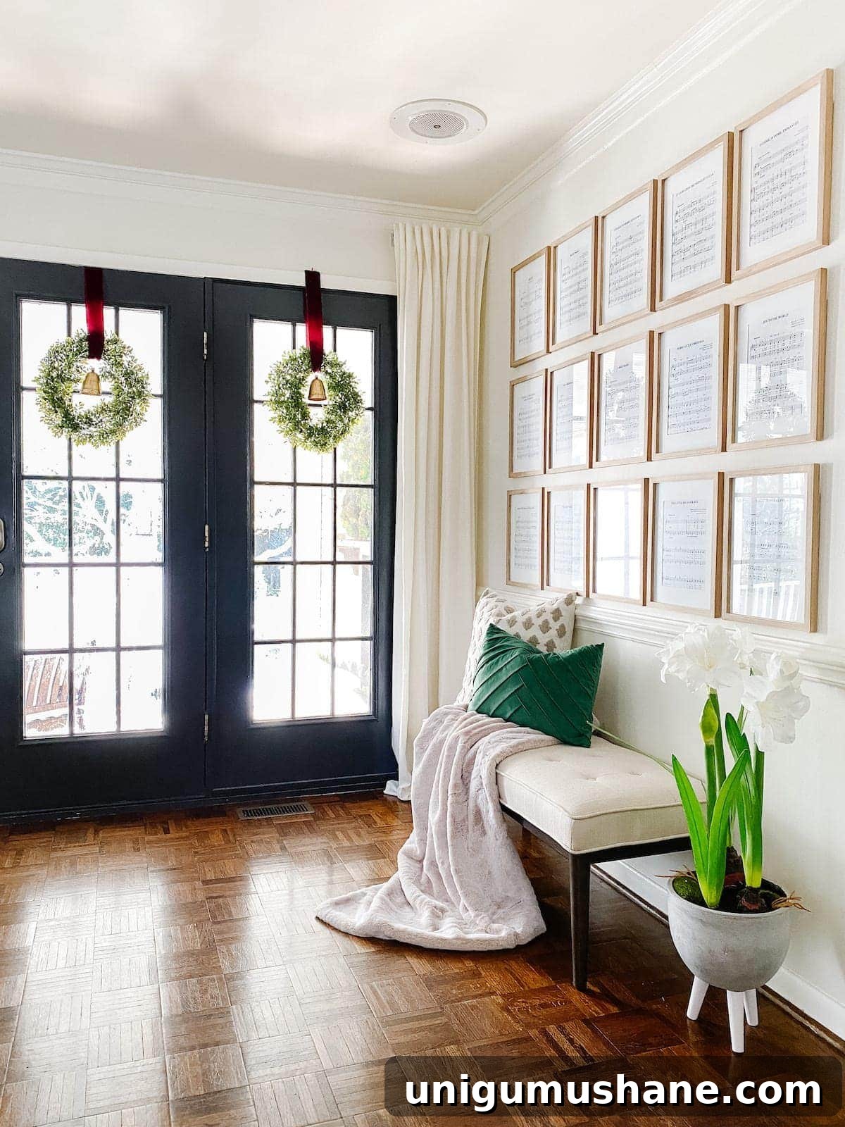 DIY Christmas Sheet Music Gallery Wall Decor 7 wreaths on windows and entryway with Christmas wall decor using sheet music art