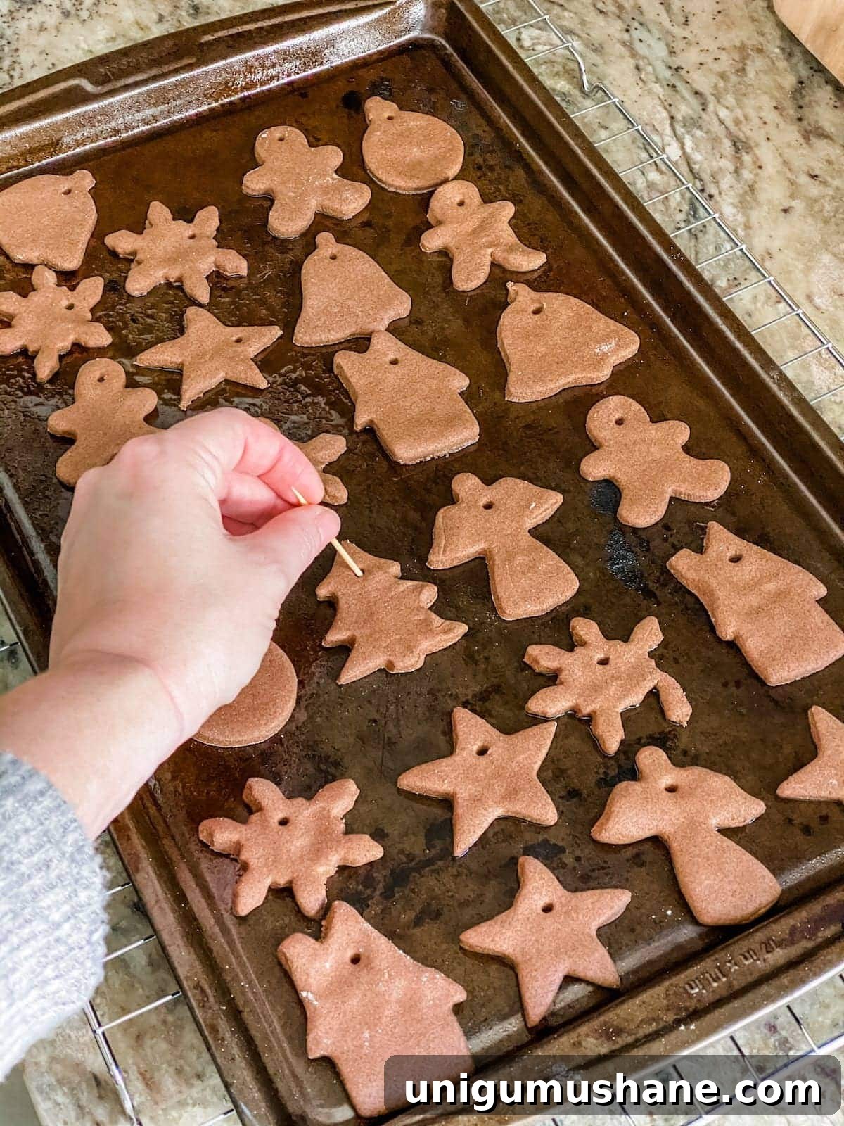 DIY Cinnamon Salt Dough Christmas Ornaments 11 DIY Cinnamon Salt Dough Ornaments | A step-by-step tutorial to make cinnamon salt dough ornaments that look just like gingerbread cookies, smell amazing, and last for years.