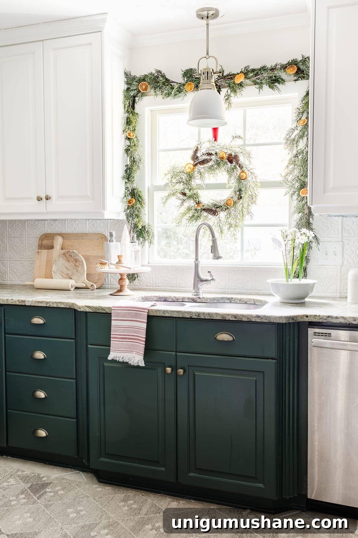 DIY Christmas Brunch Decor Ideas with Printable Art 22 Christmas kitchen window decorated with garland and wreath