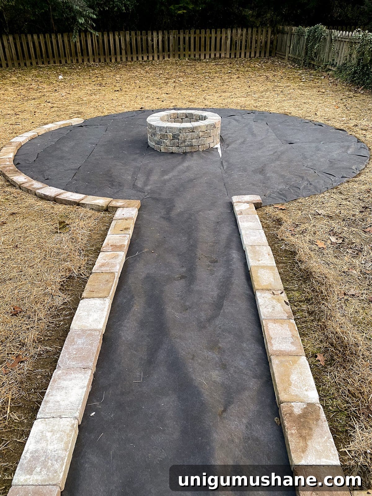 Build a Pea Gravel Backyard Fire Pit in a Weekend 13 landscape fabric around a fire pit edged with stones