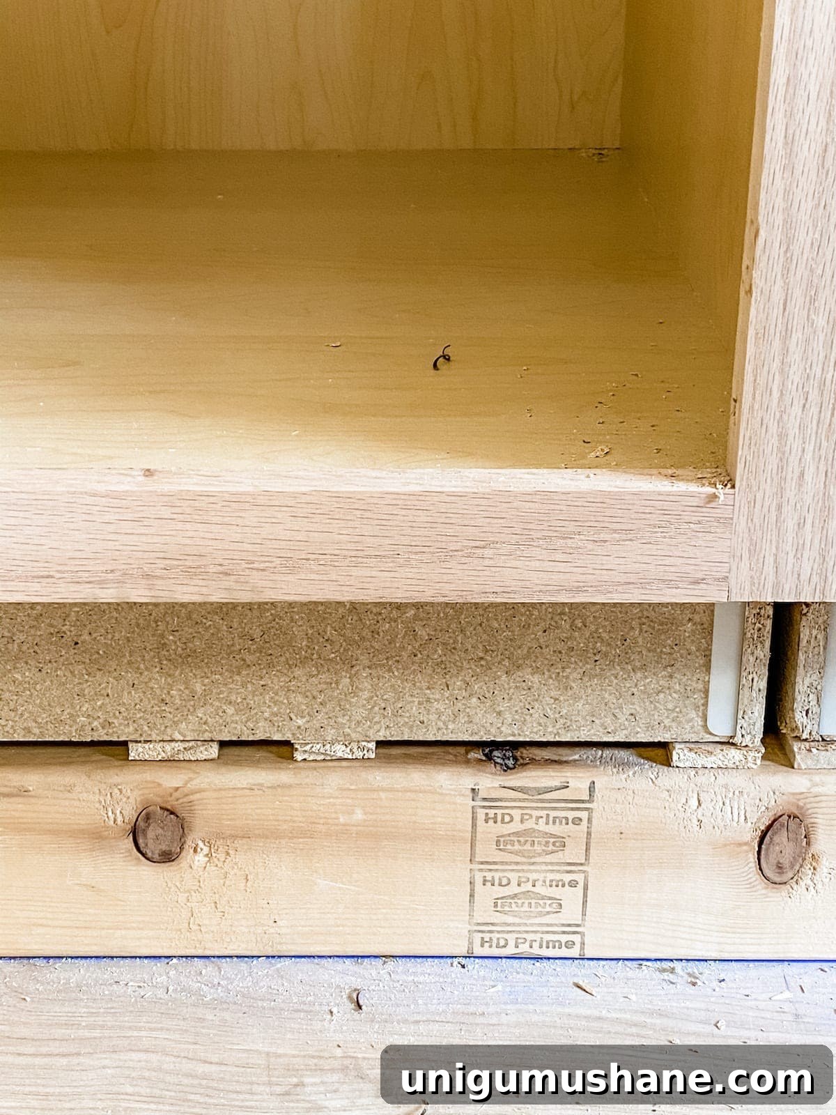 DIY Built-In Cabinets and Window Seat Plans 10 A step-by-step tutorial to build DIY built in cabinets and a window seat using inexpensive stock kitchen cabinets.