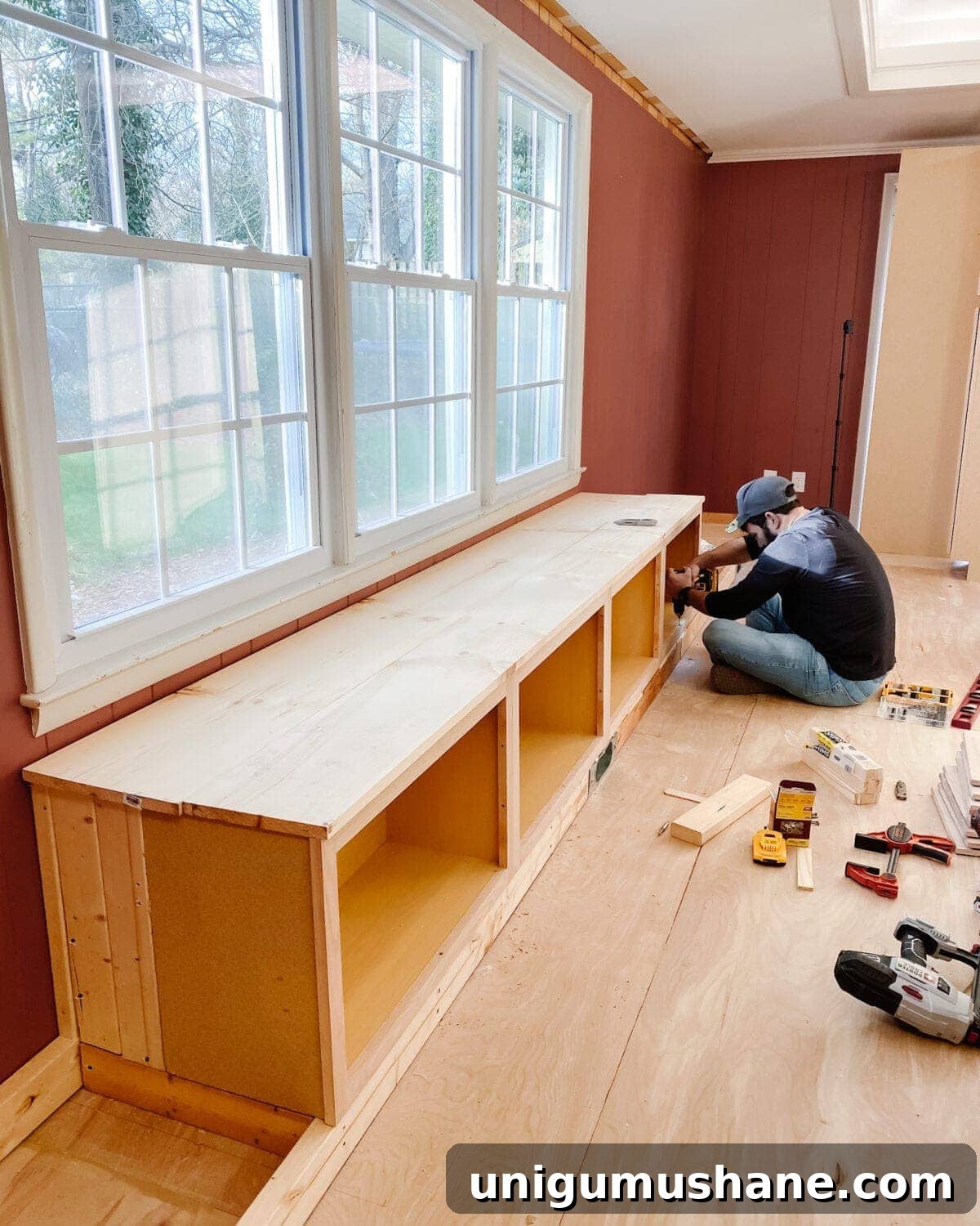 DIY Built-In Cabinets and Window Seat Plans 13 A step-by-step tutorial to build DIY built in cabinets and a window seat using inexpensive stock kitchen cabinets.