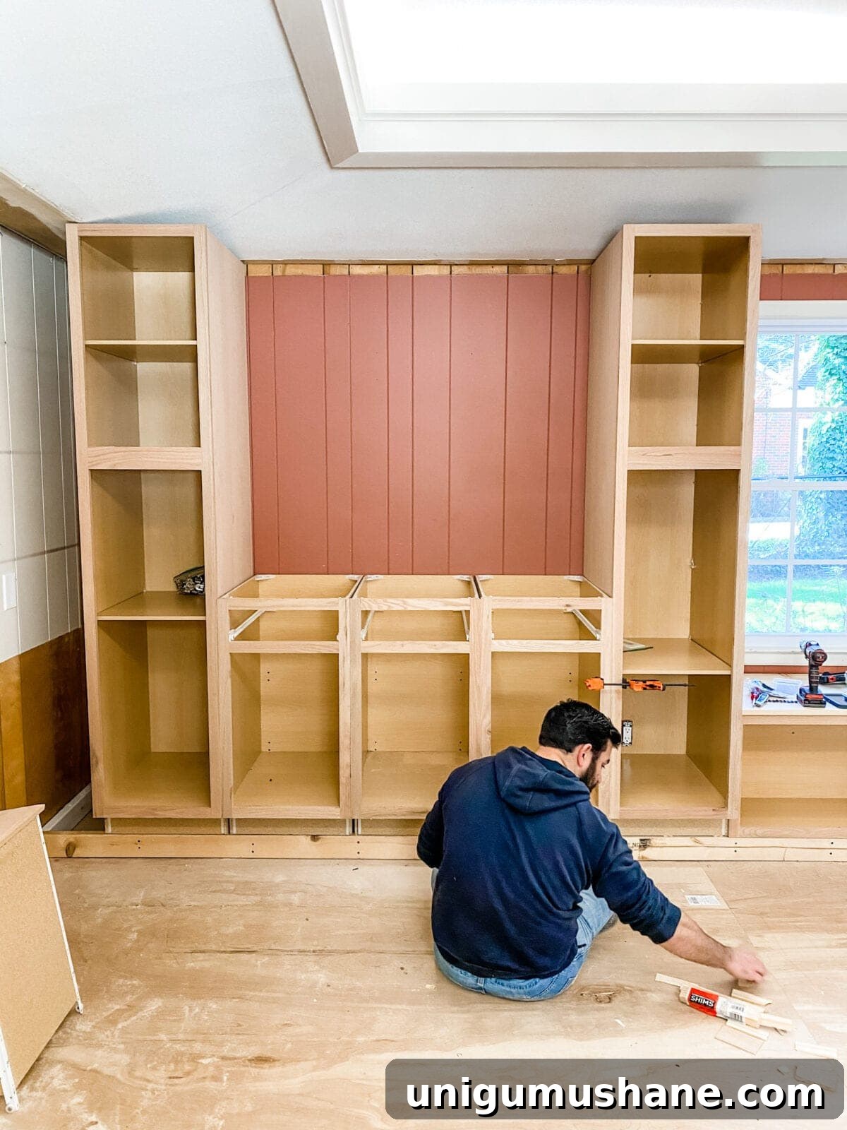 DIY Built-In Cabinets and Window Seat Plans 14 A step-by-step tutorial to build DIY built in cabinets and a window seat using inexpensive stock kitchen cabinets.