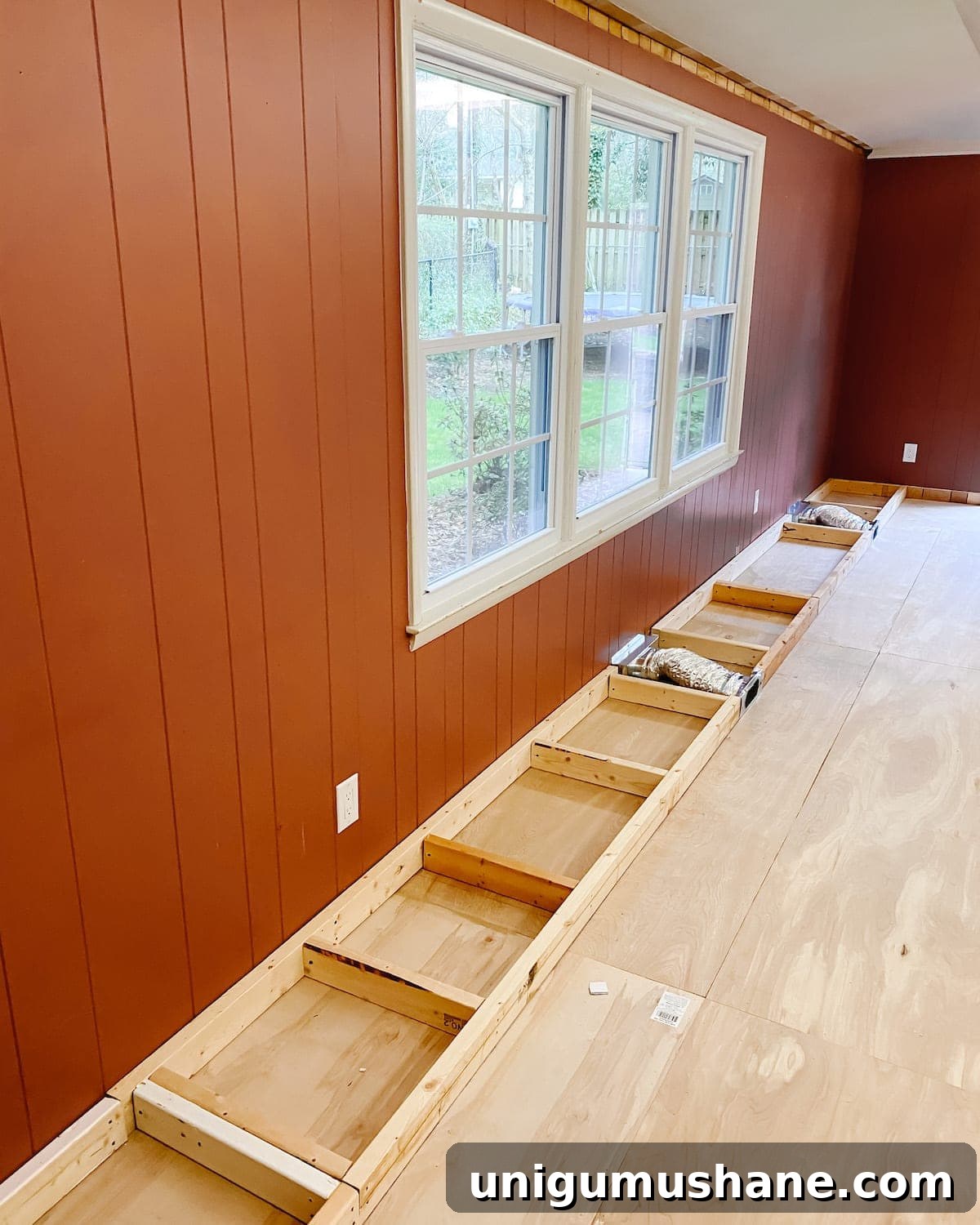 DIY Built-In Cabinets and Window Seat Plans 7 A step-by-step tutorial to build DIY built in cabinets and a window seat using inexpensive stock kitchen cabinets.
