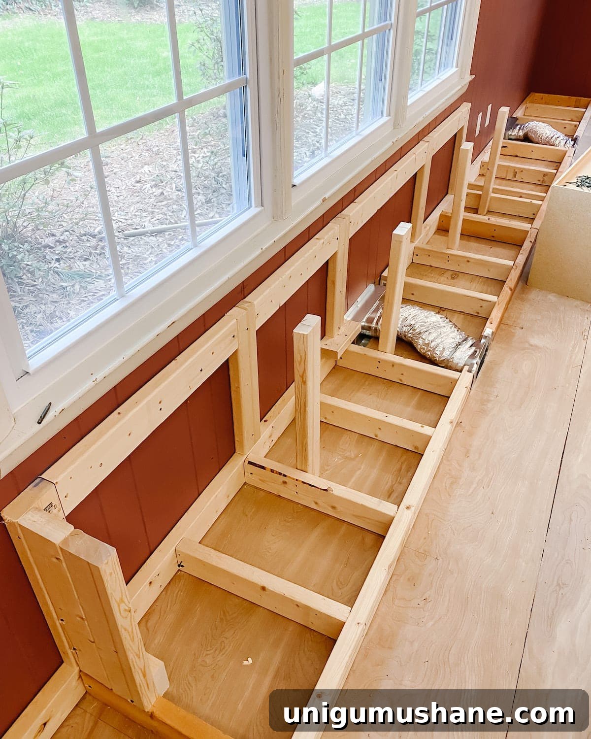 DIY Built-In Cabinets and Window Seat Plans 8 A step-by-step tutorial to build DIY built in cabinets and a window seat using inexpensive stock kitchen cabinets.