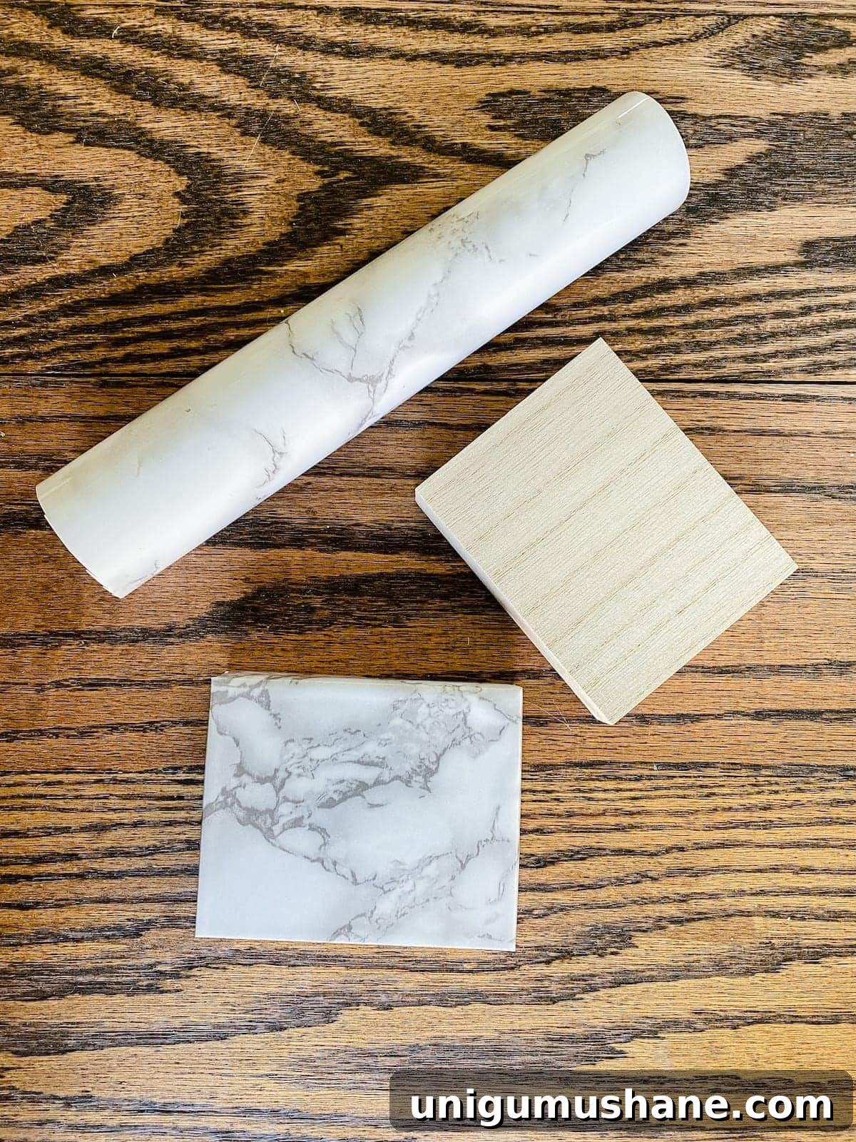 DIY Gold Leaf Sculpture: Designer Dupe for Less 5 Scrap wood block wrapped in marble contact paper