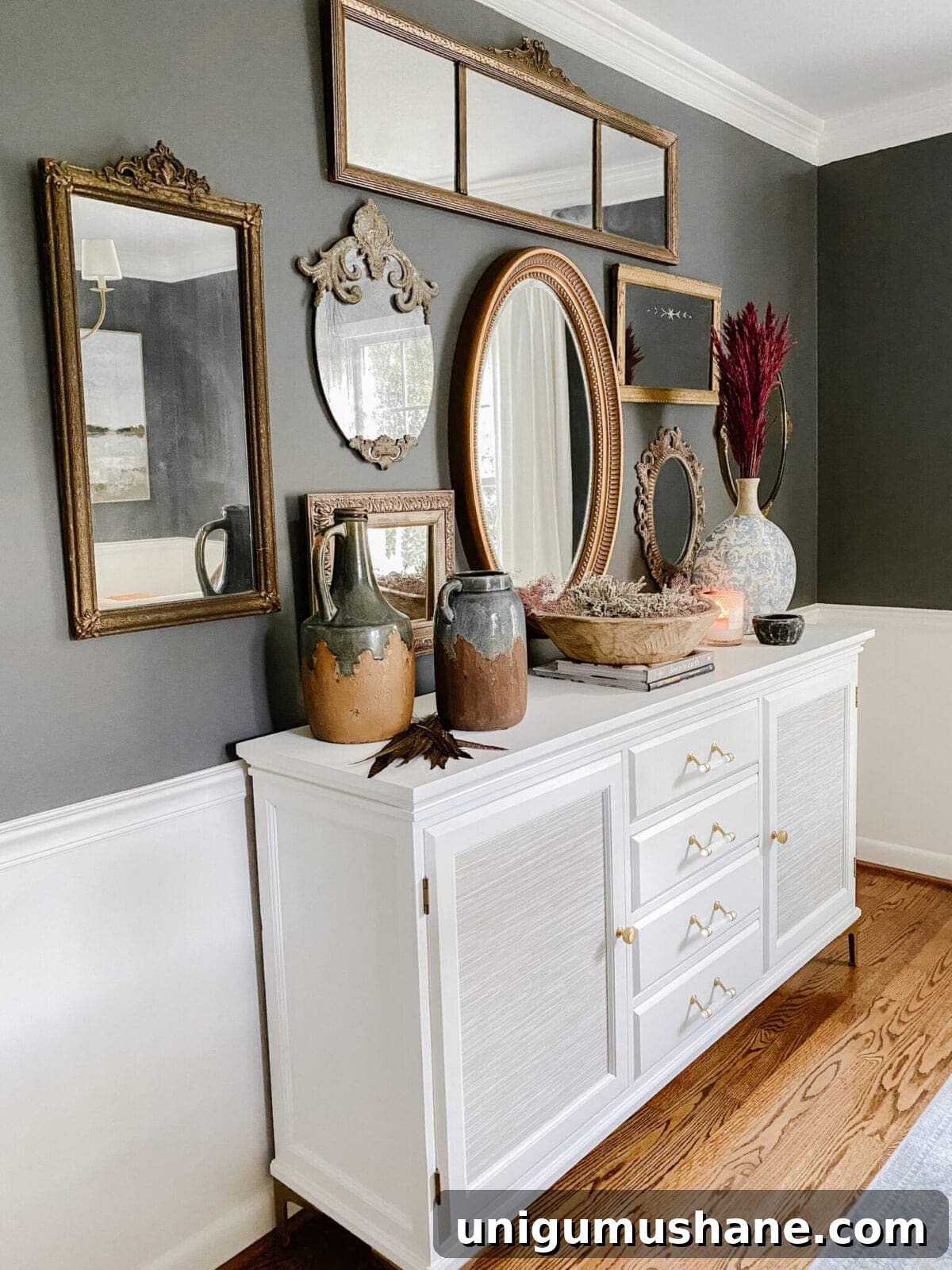 Move Beyond Farmhouse Style: Modern Home Makeover Tips 5 white painted buffet and antique mirror gallery wall