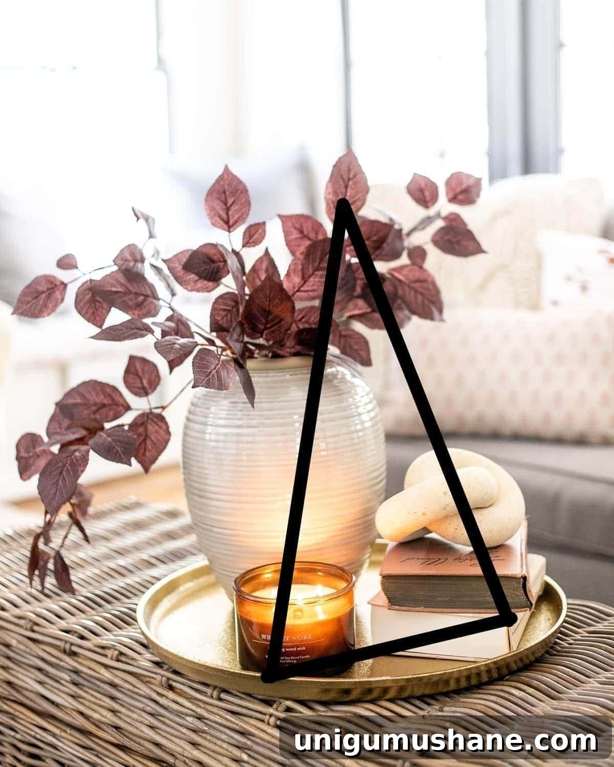 Coffee Table Decor Ideas with Styling Tips 10 the decorator's triangle on a coffee table vignette