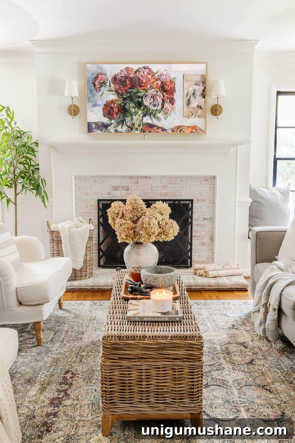 Samsung Frame TV Review: Is It Worth the Price? 7 Samsung Frame TV in living room with still life art