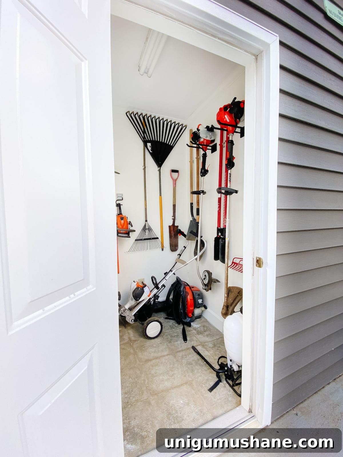 Vinyl roller shade hiding storage inside shed
