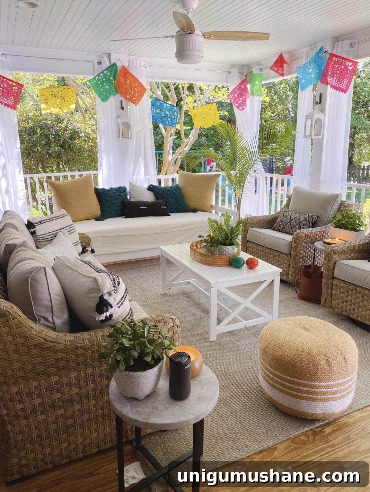 How to Plan a Fiesta Baby Shower: Themes, Decor and Menu Ideas 7 Colorful Mexican banners around back porch sitting area
