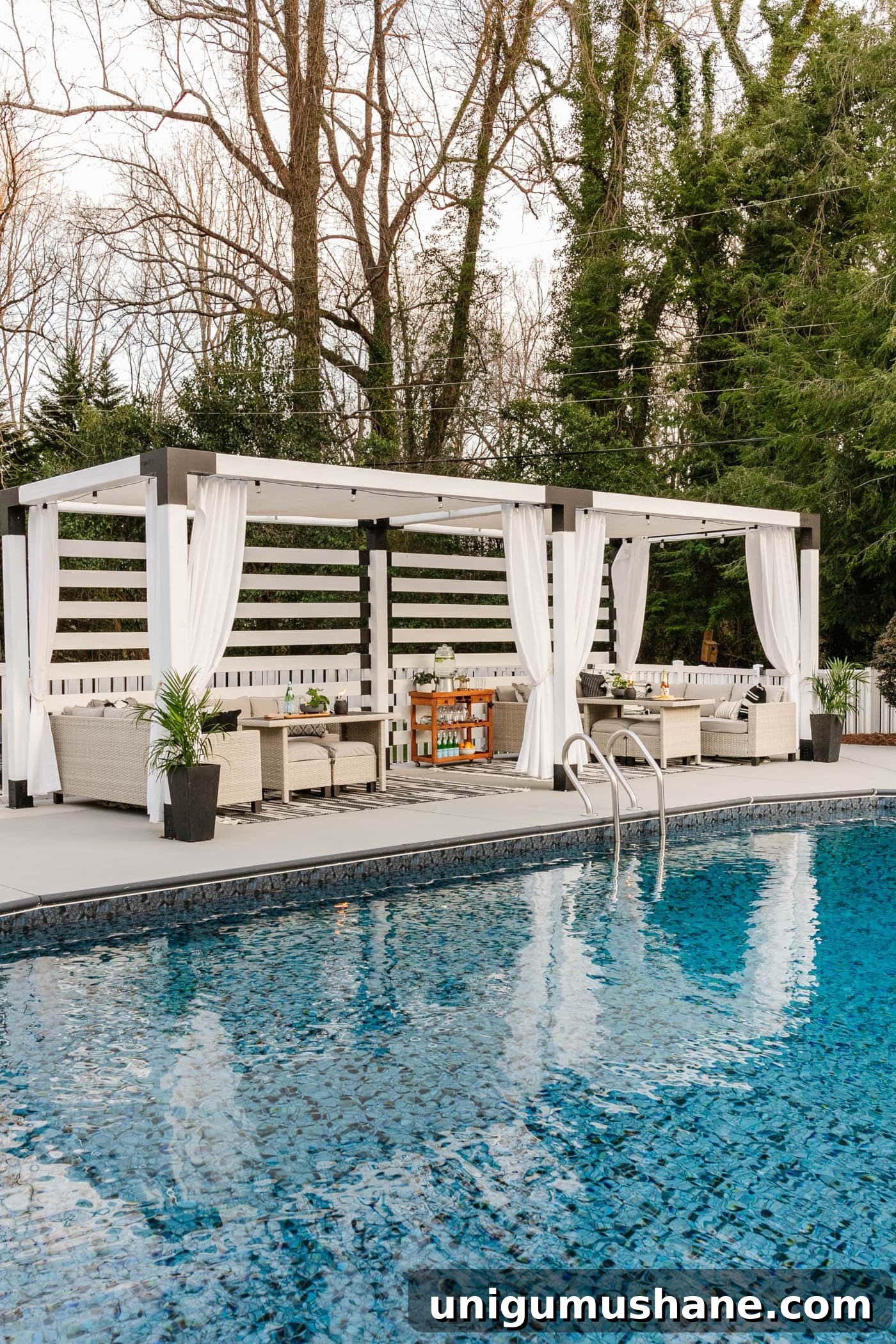 diy backyard cabana beside a swimming pool