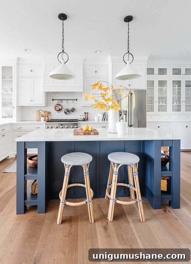 Designer-Recommended Navy Blue Paint Colors 6 Benjamin Moore Blue Note - Lilypad Cottage - dark blue paint on a kitchen island