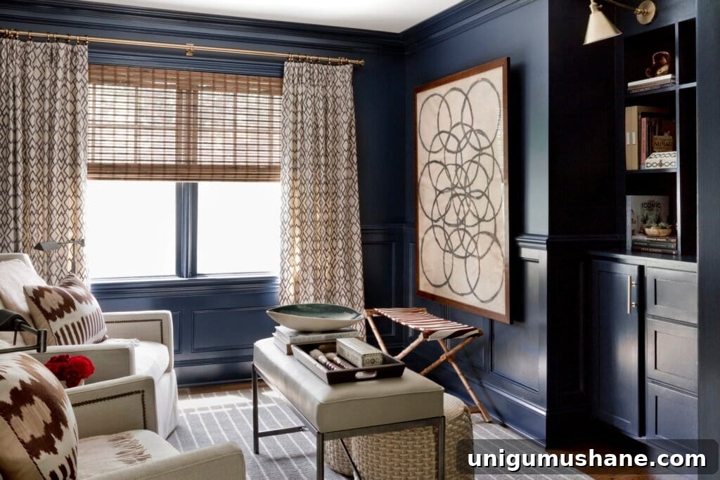 Designer-Recommended Navy Blue Paint Colors 7 Benjamin Moore Polo Blue - Becca Interiors - dark blue paint in a study