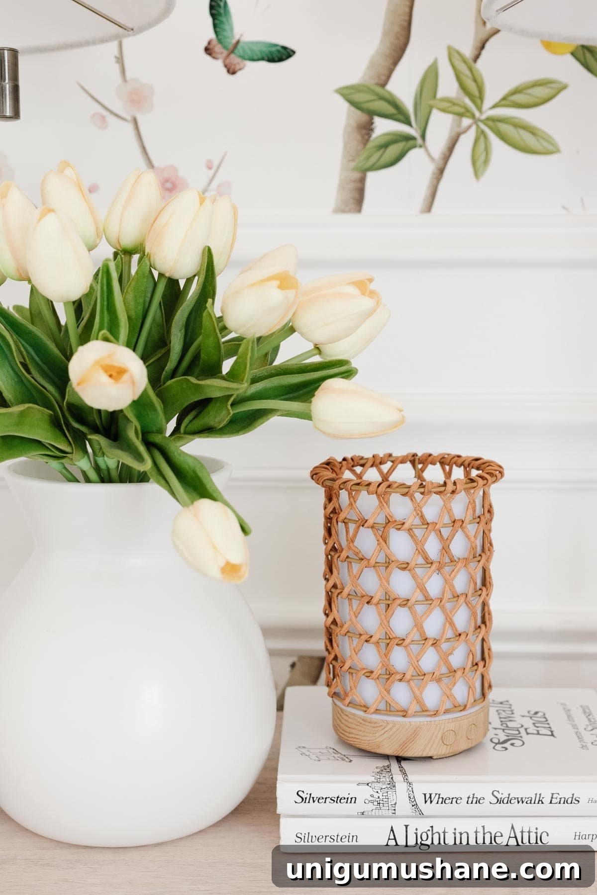 Cottagecore Toddler Girl Room Makeover Before and After 9 white vase of flowers with rattan diffuser
