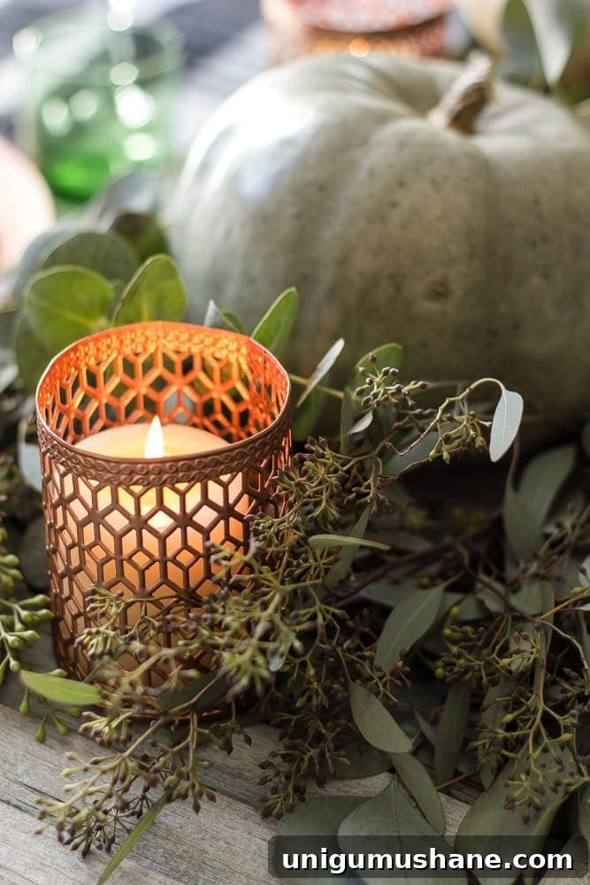 12 Budget-Friendly Fall Decor Ideas for a Luxe Look 6 copper spray painted votive holders