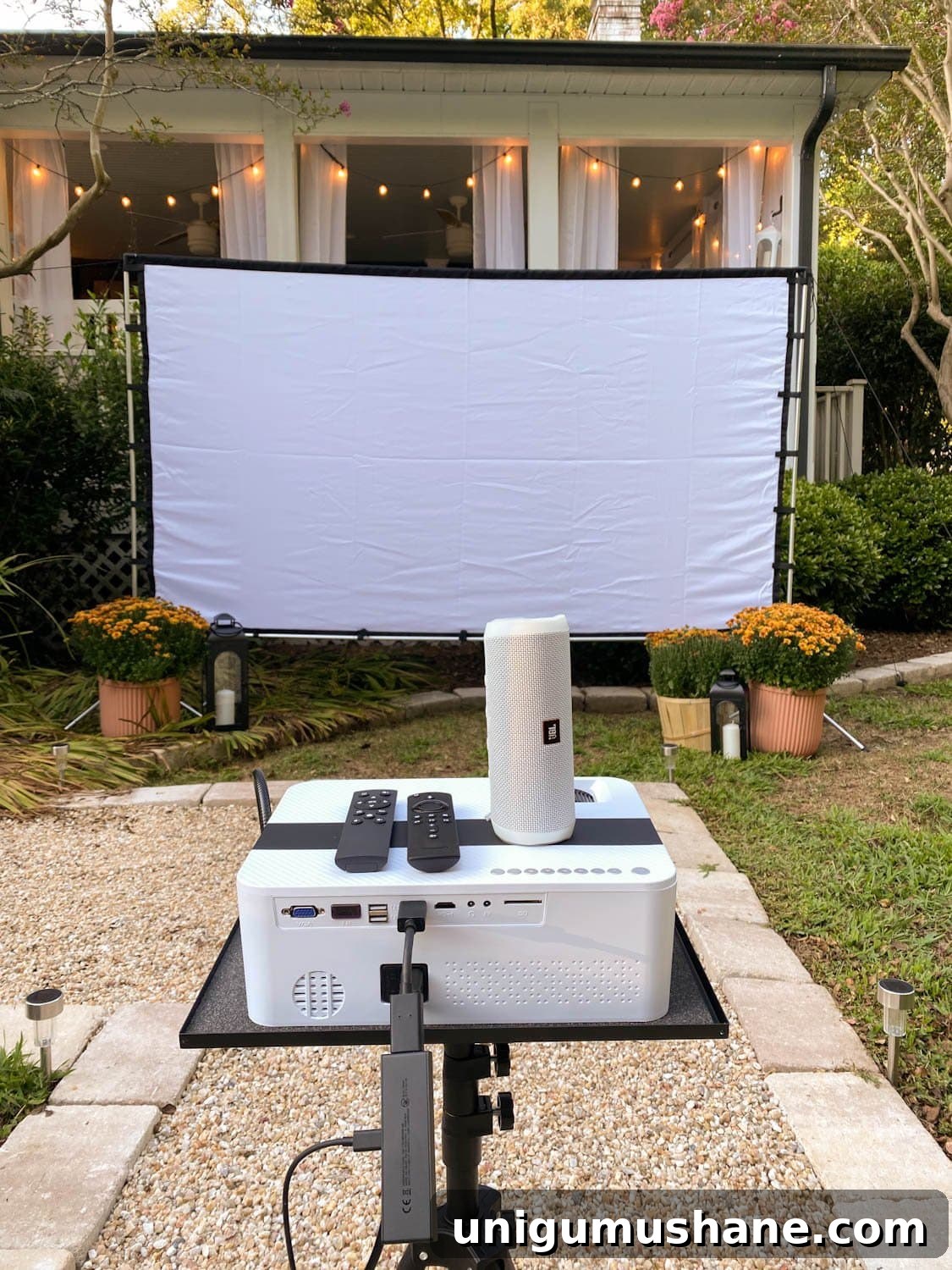 How to Host a Backyard Movie Night on a Budget 3 How to set up a backyard movie night with recommended projector, outdoor projector screen, movie streaming device, and bluetooth speaker