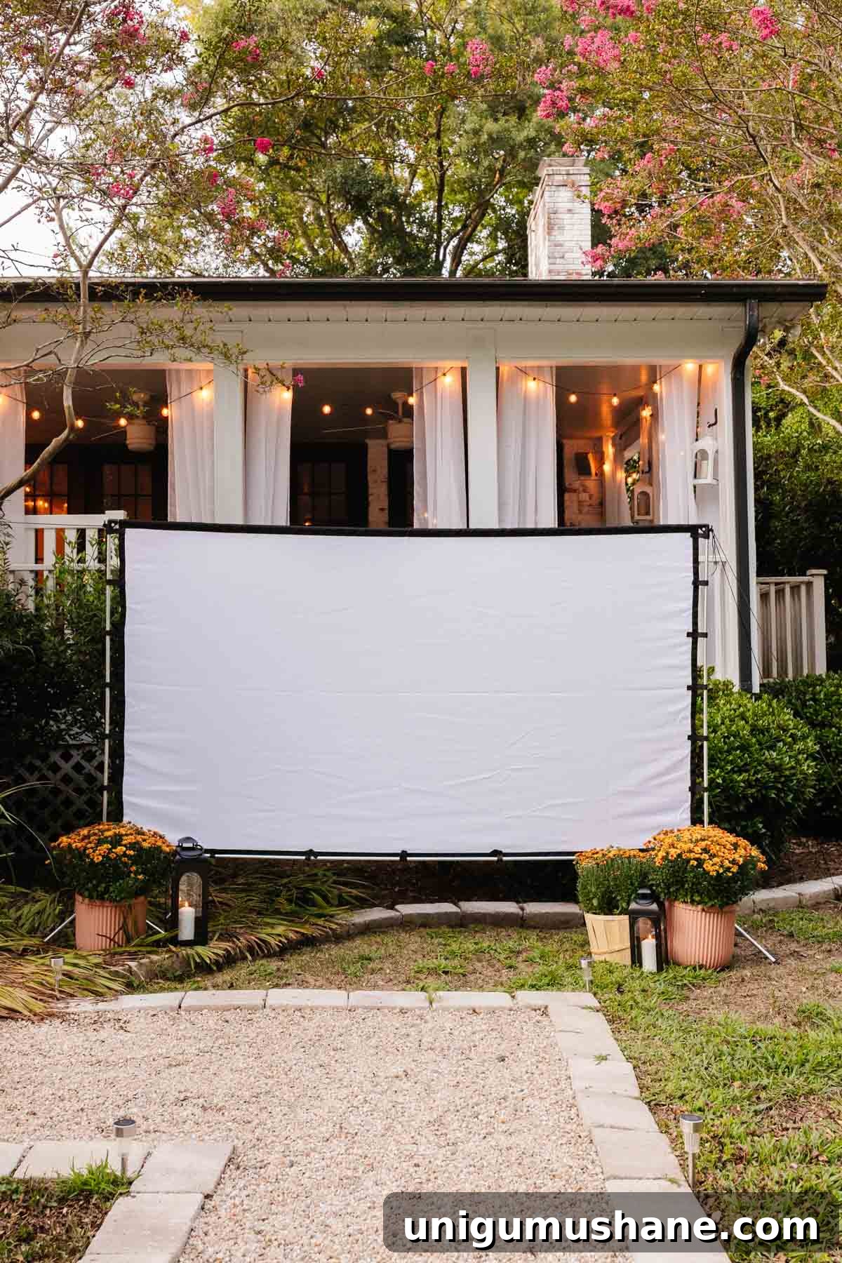 How to Host a Backyard Movie Night on a Budget 4 How to set up a backyard movie night with recommended projector and outdoor projector screen