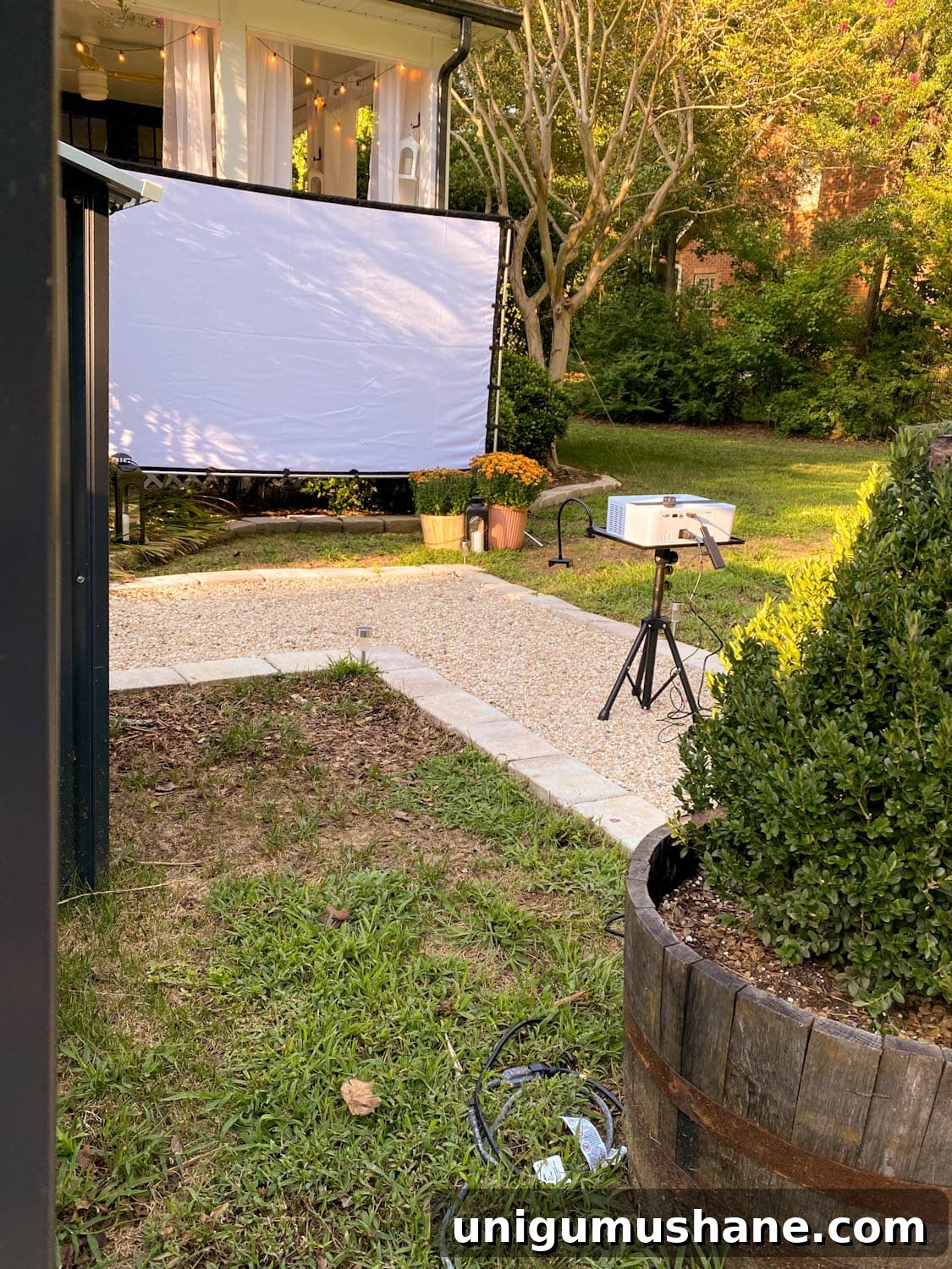 How to Host a Backyard Movie Night on a Budget 7 how to set up a backyard movie night with recommended projector and outdoor projector screen