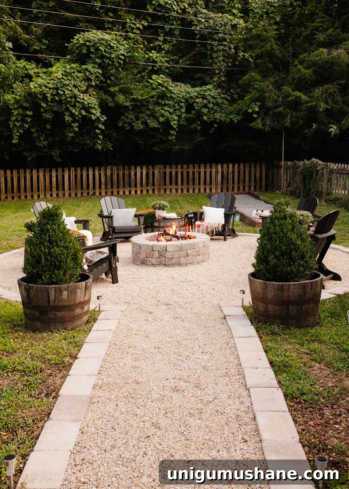 backyard fire pit decorated for fall