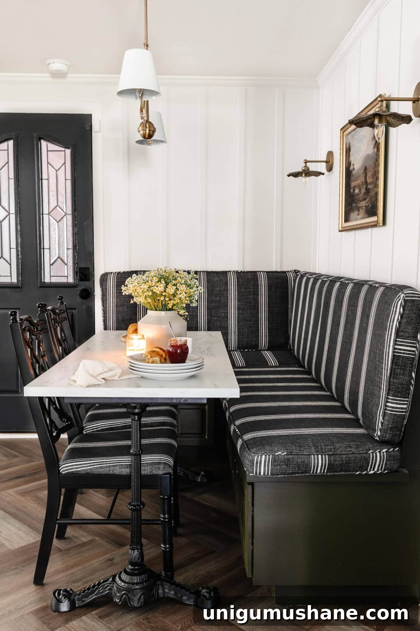Designer-Approved Off-White Paint Colors to Try 14 breakfast nook banquette with marble dining table
