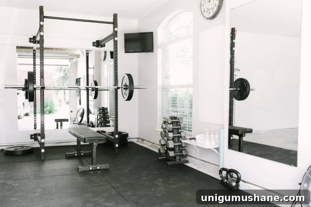DIY Home Gym Ideas for Basements, Garages, and Sheds 13 home gym with padded floor and weights