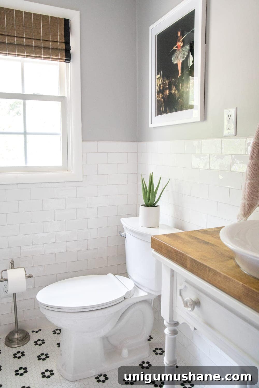 Black and White Bathroom Ideas: Small Swaps for a Classic Look 9 black and white bathroom tile with kids art