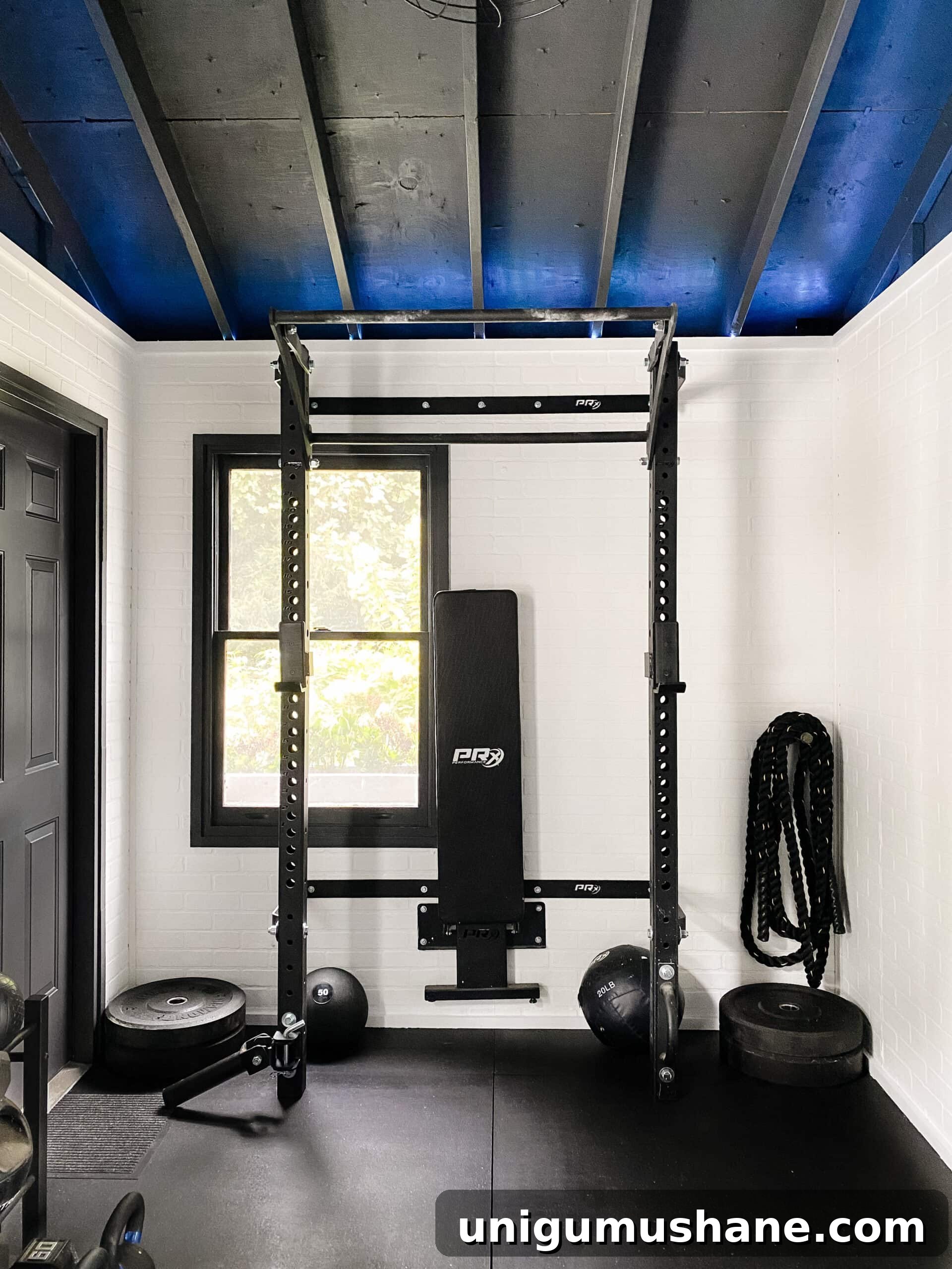 Convert Your Shed into a Home Gym on a Budget 9 workout shed with squat rack and weight lifting bench