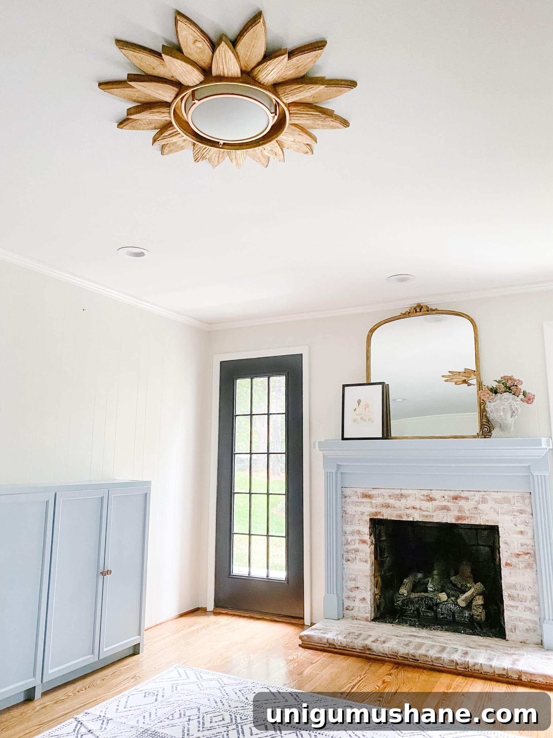 How to Upcycle a Sunburst Mirror into a Stunning Light Fixture 12 sunburst mirror diy light fixture in a playroom