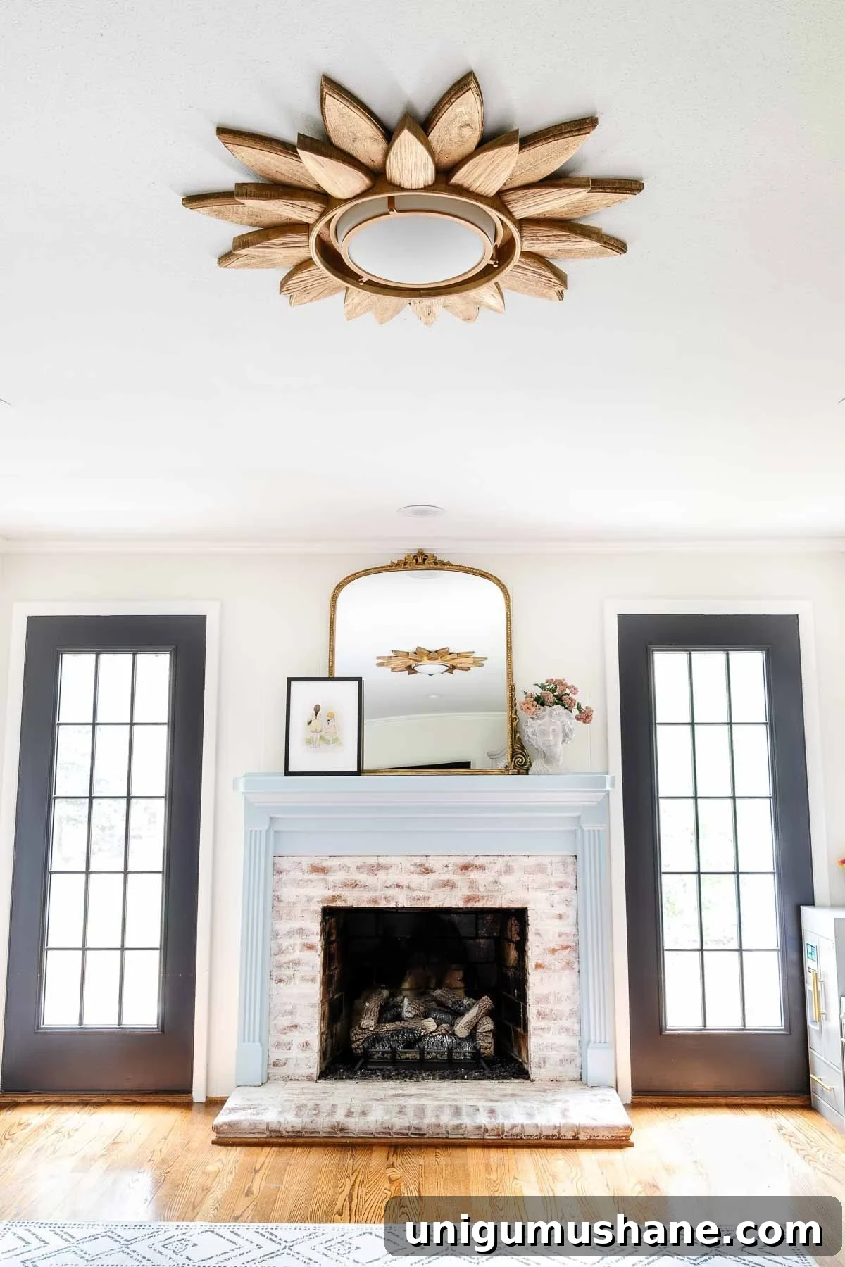 How to Upcycle a Sunburst Mirror into a Stunning Light Fixture 13 sunburst mirror diy light fixture in a playroom