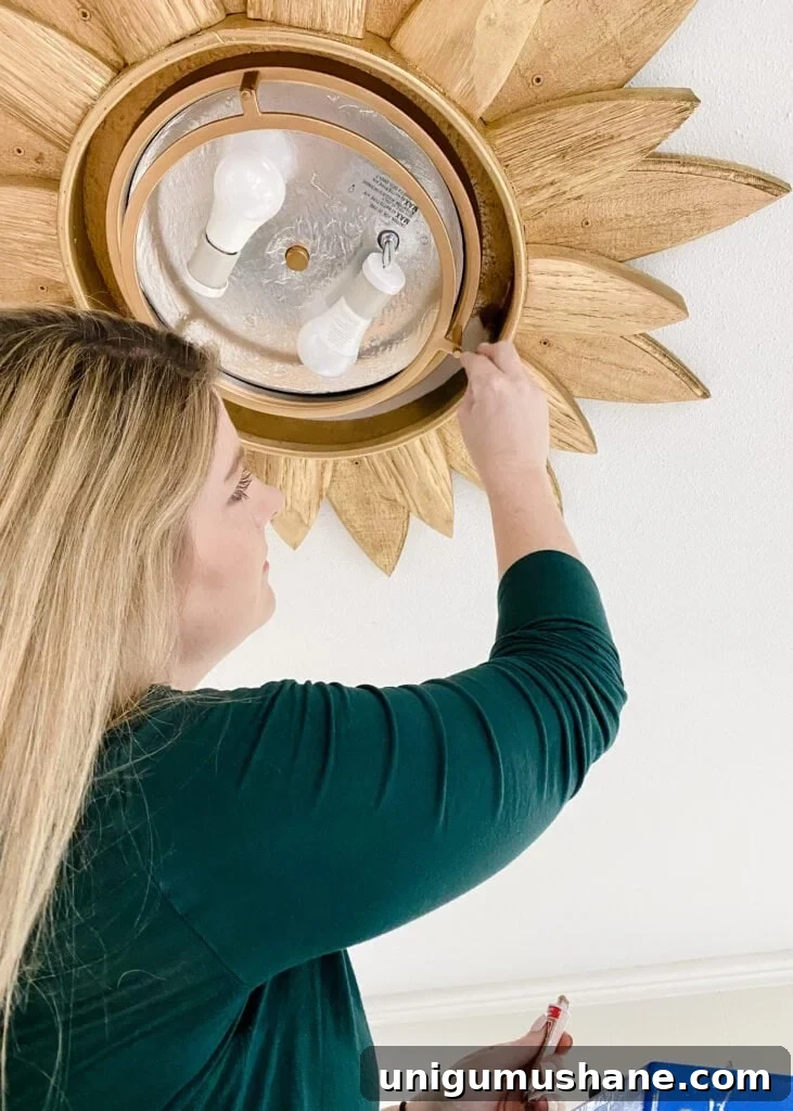 How to Upcycle a Sunburst Mirror into a Stunning Light Fixture 10 diy sunflower light fixture