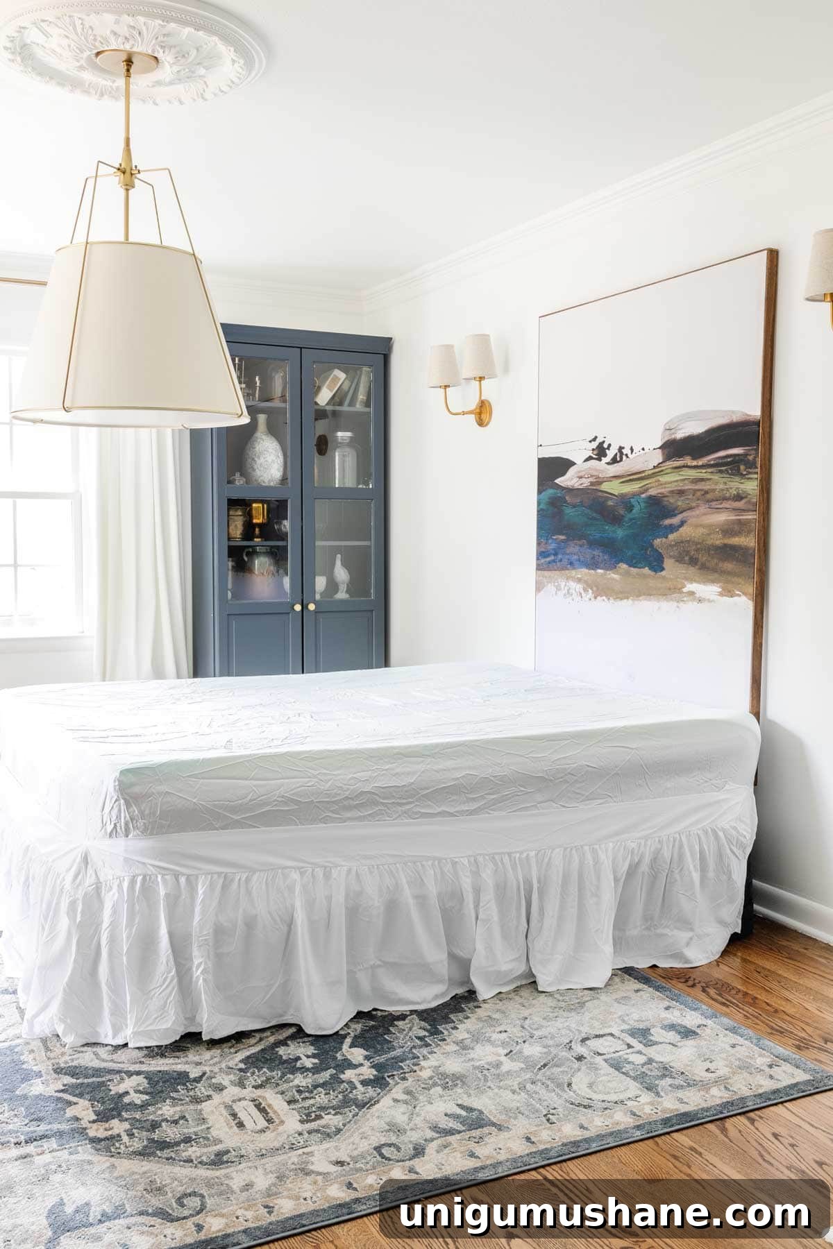 how to hide an air mattress for a temporary office guest room : use a bed skirt