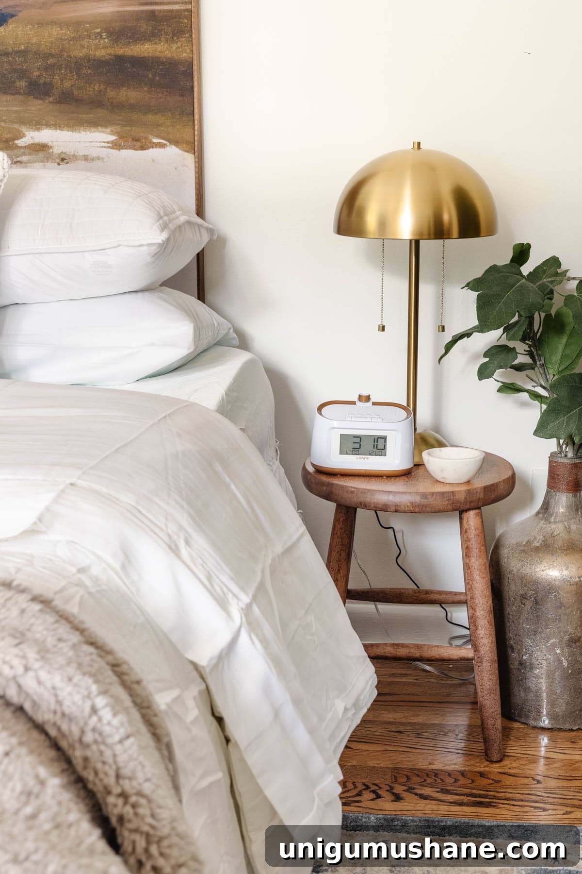 office guest room ideas : include a nightstand with a lamp and clock / white noise machine