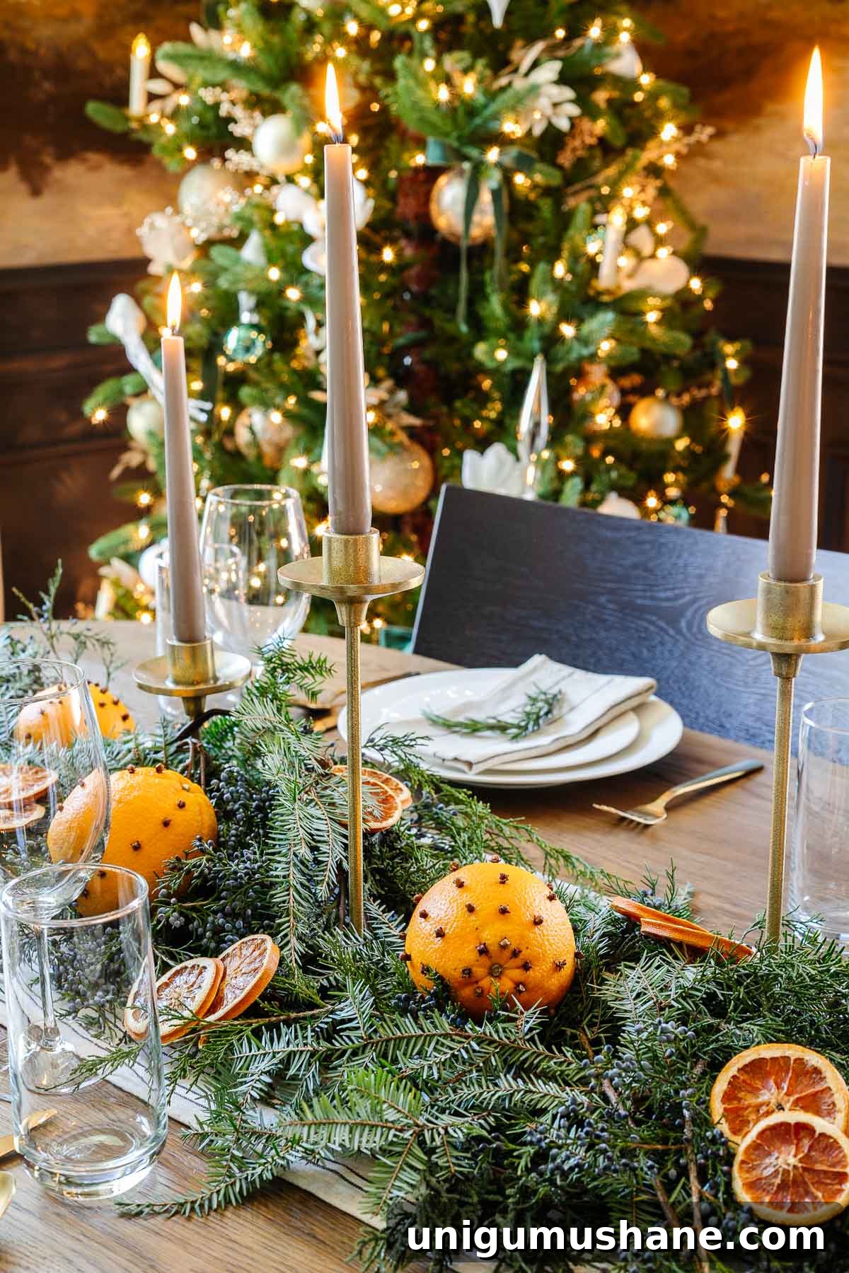 dried orange and evergreen Christmas table centerpiece